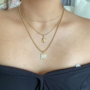 Gold plated saint necklace Lizetmirodesigns